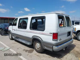 1999 Ford Econoline Cargo Recreational with VIN 1FDRE14L2XHA41059, listed as a IAAI auction lot 42067879 with 149,185 mi miles. Bid and sale history available at carsss.com. Image 14.