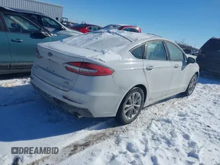 2020 Ford Fusion SE with VIN 3FA6P0HD3LR146853, listed as a IAAI auction lot 41618626 with 54,265 mi miles and . Bid and sale history available at DreamBid. Image 4.