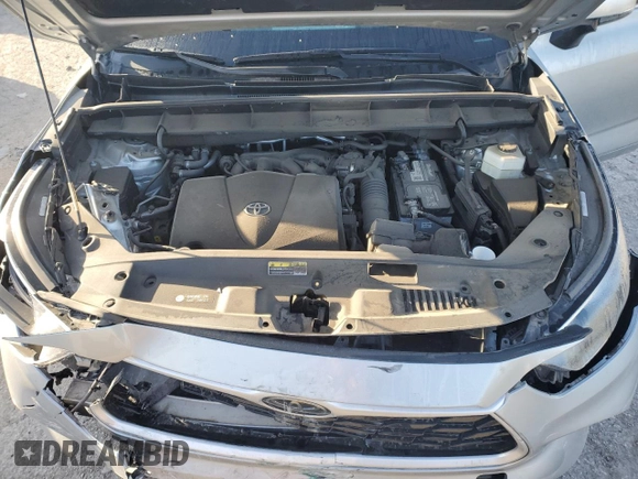 2020 Toyota Highlander L z VIN 5TDCZRAH4LS507190, wystawiony jako Copart lot #76805574 z przebiegiem Nie podano mil oraz Szkoda całkowita • Salvage title. Historia ofert i sprzedaży dostępna na DreamBid. Obrazek 14.