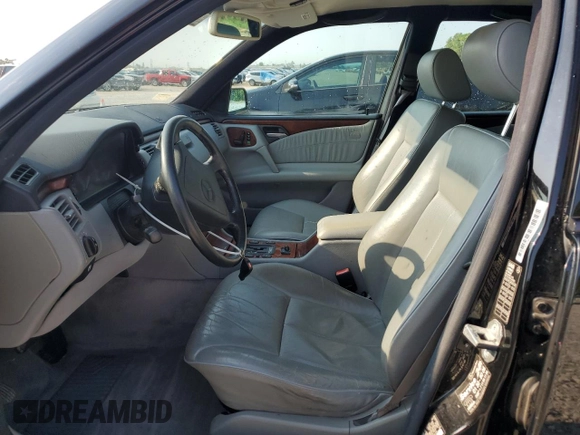 1998 Mercedes-Benz E-Class with VIN WDBJF65FXWA677383, listed as a Copart auction lot 65655114 with 110,333 mi miles and Clean Title. Bid and sale history available at carsss.com. Image 7.
