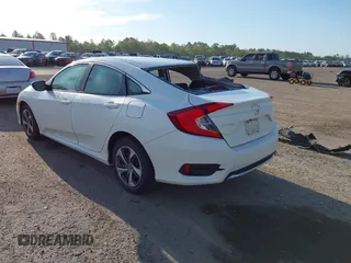 2020 Honda Civic LX with VIN 19XFC2F62LE212421, listed as a IAAI auction lot 41909995 with 46,312 mi miles and . Bid and sale history available at DreamBid. Image 3.