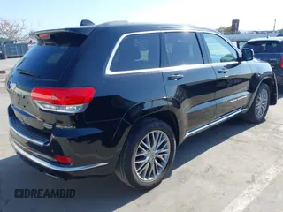 2018 Jeep Grand Cherokee Summit z VIN 1C4RJFJG8JC258642, wystawiony jako IAAI lot #42313386 z przebiegiem 102 519 mil mil oraz . Historia ofert i sprzedaży dostępna na DreamBid. Obrazek 4.