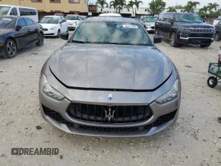 2019 Maserati Ghibli z VIN ZAM57XSA2K1328545, wystawiony jako Copart lot #56291895 z przebiegiem 53 625 mil mil oraz Tytuł czysty. Historia ofert i sprzedaży dostępna na DreamBid. Obrazek 5.