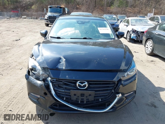 2018 Mazda 3 Touring with VIN 3MZBN1V34JM261565, listed as a IAAI auction lot 41795238 with 121,112 mi miles. Bid and sale history available at carsss.com. Image 13.