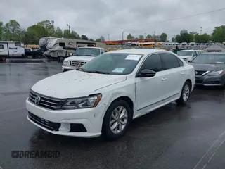 2016 Volkswagen Passat S with VIN 1VWAT7A38GC056495, listed as a IAAI auction lot 41965717 with 163,254 mi miles and . Bid and sale history available at DreamBid. Image 2.