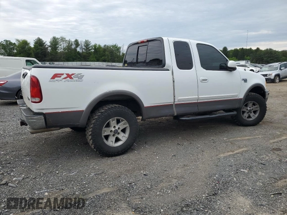 2003 Ford F-150 XL z VIN 2FTRX18L93CA55860, wystawiony jako Copart lot #57402295 z przebiegiem 312 879 mil mil oraz Szkoda całkowita • Salvage title. Historia ofert i sprzedaży dostępna na DreamBid. Obrazek 3.