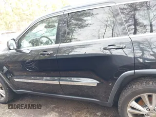 2012 Jeep Grand Cherokee Laredo with VIN 1C4RJEAG0CC316823, listed as a IAAI auction lot 41846479 with 215,317 mi miles. Bid and sale history available at carsss.com. Image 14.