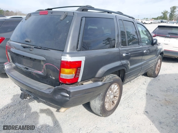 2004 Jeep Grand Cherokee Limited with VIN 1J8GW58N14C391912, listed as a IAAI auction lot 41706729 with 248,806 mi miles. Bid and sale history available at carsss.com. Image 4.