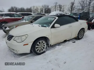 2010 Chrysler Sebring Touring with VIN 1C3BC5EDXAN219324, listed as a Copart auction lot 86085084 with 147,209 mi miles and Salvage Title. Bid and sale history available at carsss.com. Image 1.