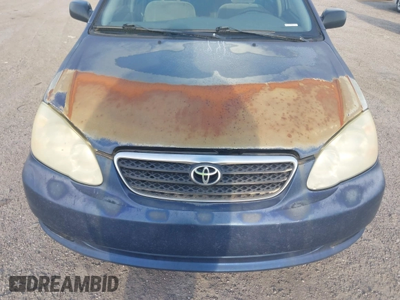 2005 Toyota Corolla CE with VIN 1NXBR32E25Z563569, listed as a IAAI auction lot 42100384 with 243,610 mi miles and . Bid and sale history available at DreamBid. Image 6.