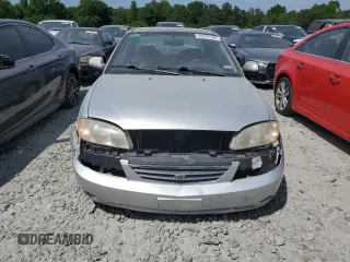 2004 Kia Spectra z VIN KNAFB121145308252, wystawiony jako Copart lot #53377555 z przebiegiem 206 439 mil mil oraz Szkoda całkowita • Salvage title. Historia ofert i sprzedaży dostępna na DreamBid. Obrazek 5.