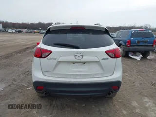 2014 Mazda CX-5 Sport with VIN JM3KE2BE8E0422322, listed as a IAAI auction lot 42009499 with 166,966 mi miles and . Bid and sale history available at carsss.com. Image 17.