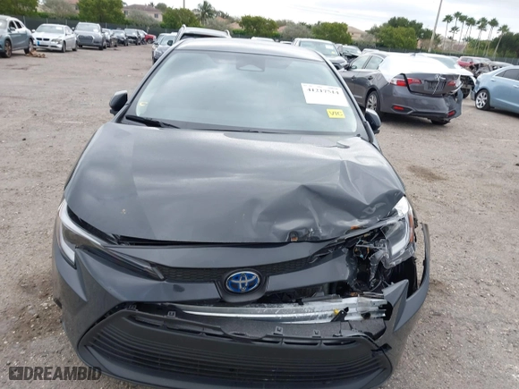 2024 Toyota Corolla Hybrid LE with VIN JTDBCMFE5R3040628, listed as a IAAI auction lot 41217514 with 41,927 mi miles. Bid and sale history available at carsss.com. Image 12.