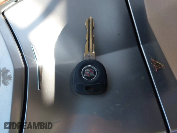2009 Cadillac CTS AWD z VIN 1G6DT57V990107958, wystawiony jako IAAI lot #41685415 z przebiegiem 148 294 mil mil oraz . Historia ofert i sprzedaży dostępna na DreamBid. Obrazek 11.