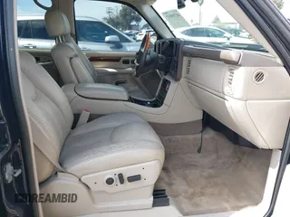 2004 Cadillac Escalade z VIN 1GYEC63T34R273497, wystawiony jako IAAI lot #41719537 z przebiegiem 256 975 mil mil oraz . Historia ofert i sprzedaży dostępna na DreamBid. Obrazek 5.