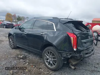 2015 Cadillac SRX z VIN 3GYFNAE30FS515953, wystawiony jako IAAI lot #40562508 z przebiegiem 163 112 mil mil oraz . Historia ofert i sprzedaży dostępna na DreamBid. Obrazek 3.