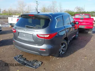2013 Infiniti JX35 with VIN 5N1AL0MM4DC303338, listed as a IAAI auction lot 41961761 with 170,572 mi miles. Bid and sale history available at carsss.com. Image 4.