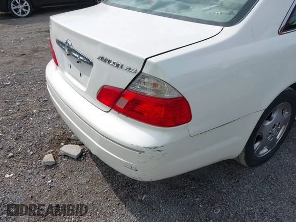 2003 Toyota Avalon XL with VIN 4T1BF28B73U321678, listed as a IAAI auction lot 42083979 with 283,606 mi miles and . Bid and sale history available at carsss.com. Image 12.