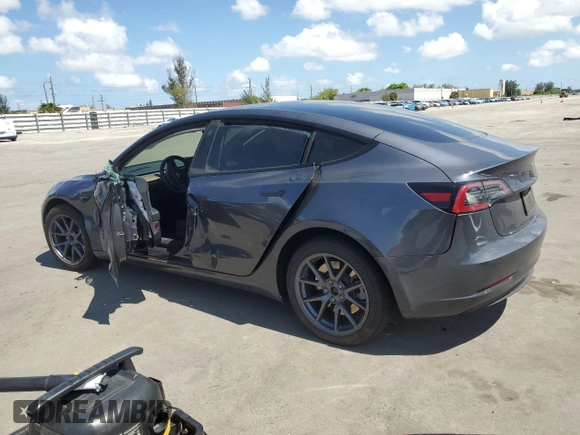 2023 Tesla Model 3 with VIN 5YJ3E1EA8PF704349, listed as a Copart auction lot 60220665 with 18,873 mi miles and Non repairable. Bid and sale history available at DreamBid. Image 2.