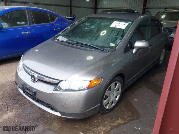 2006 Honda Civic Sdn LX with VIN 1HGFA16536L136583, listed as a IAAI auction lot 41942096 with 336,148 mi miles. Bid and sale history available at carsss.com. Image 17.