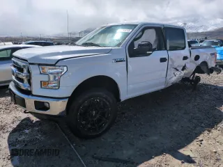 2015 Ford F-150 XLT with VIN 1FTEW1EF5FFB17148, listed as a Copart auction lot 51265215 with 128,011 mi miles and Salvage Title. Bid and sale history available at carsss.com. Image 1.