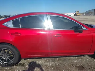 2017 Mazda 6 Sport z VIN JM1GL1U52H1125024, wystawiony jako IAAI lot #42115413 z przebiegiem 191 727 mil mil oraz . Historia ofert i sprzedaży dostępna na DreamBid. Obrazek 14.