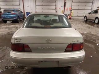 1995 Toyota Camry LE with VIN 4T1GK12E5SU080734, listed as a IAAI auction lot 41738102 with 211,559 mi miles. Bid and sale history available at carsss.com. Image 17.