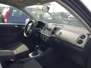 2012 Volkswagen Tiguan SE with VIN WVGAV7AXXCW526403, listed as a IAAI auction lot 41852974 with 125,376 mi miles and . Bid and sale history available at DreamBid. Image 5.