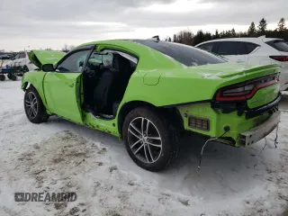 2019 Dodge Charger SXT with VIN 2C3CDXJG1KH706449, listed as a Copart auction lot 85907394 with 147,526 mi miles and Salvage Title. Bid and sale history available at DreamBid. Image 2.