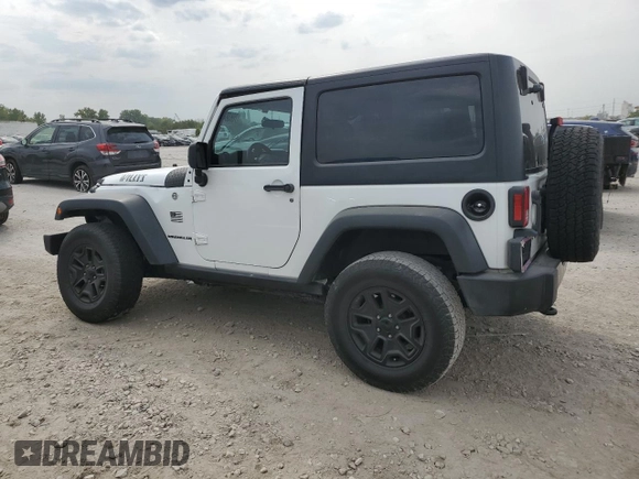 2016 Jeep Wrangler Willys Wheeler z VIN 1C4AJWAG7GL297695, wystawiony jako Copart lot #70838414 z przebiegiem 82 813 mil mil oraz Szkoda całkowita • Salvage title. Historia ofert i sprzedaży dostępna na DreamBid. Obrazek 2.