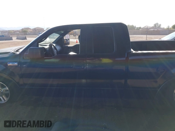 2005 Ford F-150 XLT with VIN 1FTPX12525NB25391, listed as a IAAI auction lot 41588721 with 241,743 mi miles. Bid and sale history available at carsss.com. Image 14.