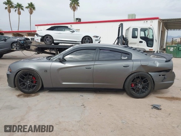 2012 Dodge Charger SXT with VIN 2C3CDXHG8CH244592, listed as a IAAI auction lot 41548991 with 116,855 mi miles. Bid and sale history available at carsss.com. Image 14.