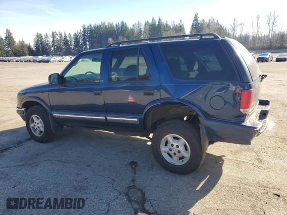 2000 Chevrolet Blazer LT z VIN 1GNDT13W8Y2119632, wystawiony jako Copart lot #47387175 z przebiegiem 140 356 mil mil oraz Szkoda całkowita • Salvage title. Historia ofert i sprzedaży dostępna na DreamBid. Obrazek 2.