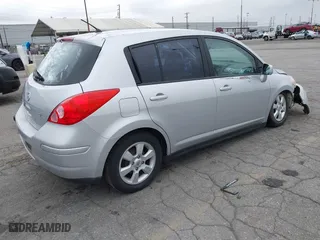 2009 Nissan Versa 1.8 S with VIN 3N1BC13E09L406828, listed as a IAAI auction lot 42075391 with 136,671 mi miles. Bid and sale history available at carsss.com. Image 4.