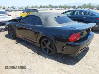 2002 Ford Mustang GT Deluxe with VIN 1FAFP45X92F229236, listed as a IAAI auction lot 42565552 with 122,504 mi miles and . Bid and sale history available at DreamBid. Image 3.