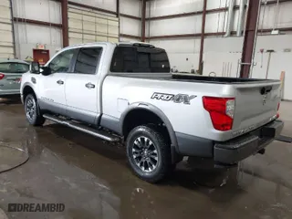 2017 Nissan Titan XD PRO-4X with VIN 1N6BA1F42HN515535, listed as a IAAI auction lot 41770534 with 73,733 mi miles. Bid and sale history available at carsss.com. Image 3.