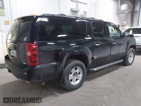 2008 Chevrolet Suburban LTZ with VIN 3GNFK16328G191186, listed as a IAAI auction lot 42102717 with 185,236 mi miles and . Bid and sale history available at DreamBid. Image 4.