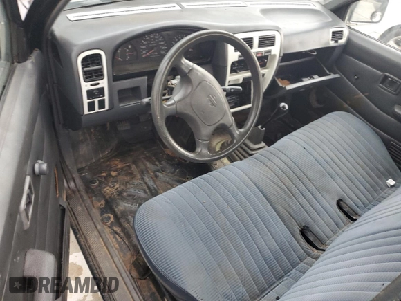 1994 Nissan Frontier XE z VIN 1N6SD16S3RC305688, wystawiony jako Copart lot #54371715 z przebiegiem 207 543 mil mil oraz Szkoda całkowita • Salvage title. Historia ofert i sprzedaży dostępna na DreamBid. Obrazek 8.