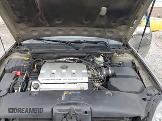 2000 Cadillac DeVille z VIN 1G6KD54Y5YU317015, wystawiony jako IAAI lot #42441249 z przebiegiem 82 901 mil mil oraz . Historia ofert i sprzedaży dostępna na DreamBid. Obrazek 10.