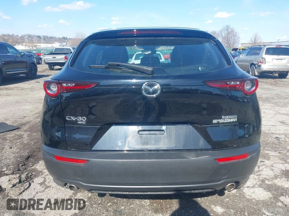 2021 Mazda CX-30 S with VIN 3MVDMBAL5MM249910, listed as a IAAI auction lot 41875515 with 39,190 mi miles and . Bid and sale history available at carsss.com. Image 15.