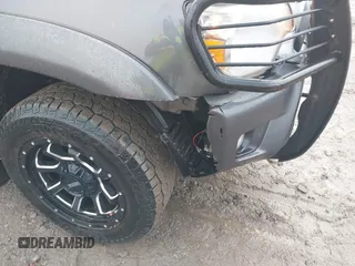 2015 Toyota Tacoma with VIN 3TMLU4EN7FM201302, listed as a IAAI auction lot 41666606 with 200,504 mi miles and . Bid and sale history available at DreamBid. Image 6.