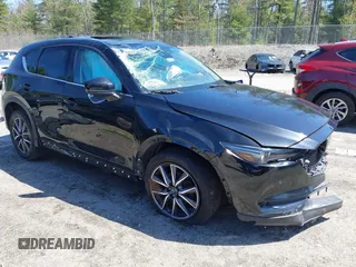 2018 Mazda CX-5 Grand Touring с VIN JM3KFADM3J0365419, выставлен на аукционе IAAI как лот 42123064 с пробегом 121 285 миль миль и . История ставок и продаж доступна на DreamBid. Изображение 1.