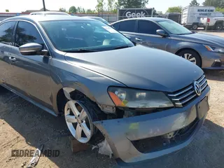 2015 Volkswagen Passat 1.8T Wolfsburg Ed with VIN 1VWAT7A3XFC115934, listed as a IAAI auction lot 41948035 with 243,143 mi miles. Bid and sale history available at carsss.com. Image 6.
