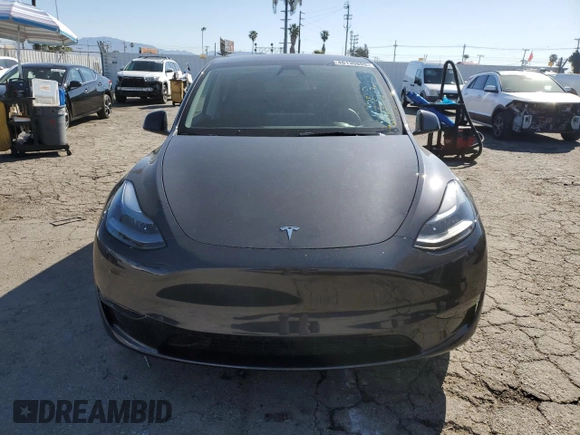 2024 Tesla Model Y Long Range z VIN 7SAYGAEE2RF009616, wystawiony jako Copart lot #46139805 z przebiegiem 6 535 mil mil oraz Szkoda całkowita • Salvage title. Historia ofert i sprzedaży dostępna na DreamBid. Obrazek 5.