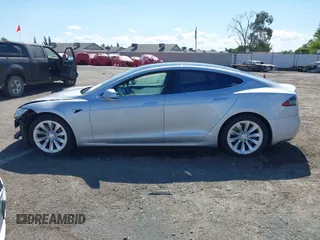 2016 Tesla Model S 90D with VIN 5YJSA1E22GF174637, listed as a IAAI auction lot 42234083 with 142,915 mi miles and . Bid and sale history available at DreamBid. Image 15.