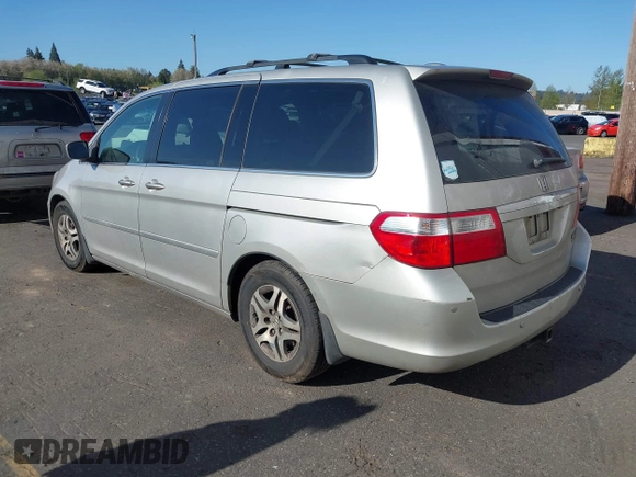 2005 Honda Odyssey TOURING with VIN 5FNRL38855B069043, listed as a IAAI auction lot 42035153 with 236,533 mi miles. Bid and sale history available at carsss.com. Image 3.