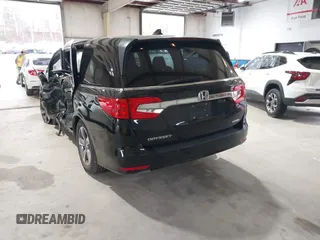 2018 Honda Odyssey Touring with VIN 5FNRL6H87JB105410, listed as a IAAI auction lot 41860707 with 91,908 mi miles. Bid and sale history available at carsss.com. Image 3.