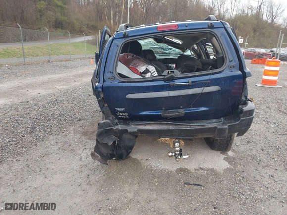 2002 Jeep Grand Cherokee Laredo with VIN 1J4GW48S82C321712, listed as a IAAI auction lot 41855809 with 1 mi miles. Bid and sale history available at carsss.com. Image 20.