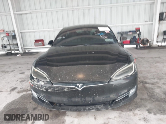 2017 Tesla Model S 60 z VIN 5YJSA1E17HF179051, wystawiony jako IAAI lot #42430013 z przebiegiem 201 174 mil mil oraz . Historia ofert i sprzedaży dostępna na DreamBid. Obrazek 13.