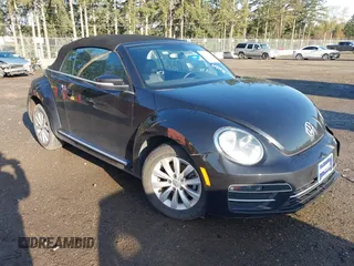 2018 Volkswagen Beetle S with VIN 3VW5DAAT5JM515743, listed as a IAAI auction lot 42014567 with Not Provided miles and . Bid and sale history available at DreamBid. Image 1.